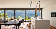 Load image into Gallery viewer, White triple linear slot diffuser ceiling installed in a modern kitchen and dining area – Flo-Matrix HVAC
