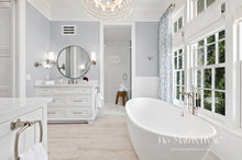 Load image into Gallery viewer, Modern white air vent cover mounted on a bathroom wall in a luxury spa-inspired interior, providing a sleek retrofit HVAC register solution with contemporary architectural styling and efficient airflow performance.
